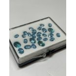 14.91cts of light blue oval cut stones in various sizes
