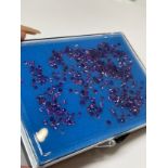 30cts of round cut purple stones