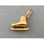 9ct gold ice skating boot pendant/charm (1g)