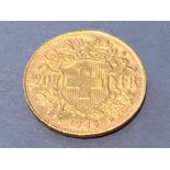 1935 Gold Switzerland 20 francs, young head coin Helvetia (6.4g)