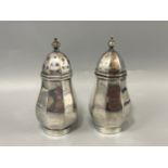 A pair of silver salt and pepper shakers hallmarked Birmingham 1921, weight 100.78 grams