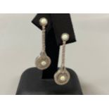 A pair of silver CZ and opal panelled drop earrings in the art deco style, weight 5.76 grams