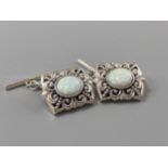 A pair of silver marcasite and opal panelled cufflinks, weight 9.78grams