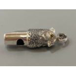 A silver bird whistle, weight 10.9 grams