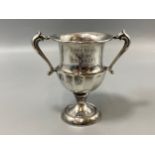 A hallmarked silver Chester 1937 small trophy, weight 31.66 grams
