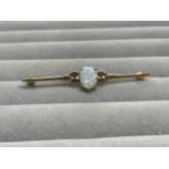 9ct Fully Hallmarked Fancy Design Brooch Featuring a 1.5ct Opal Weighing 3.17 grams Measuring 5cm in