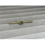 15ct Yellow Gold Hallmarked Bar Brooch Featuring a Green Stone and Seed Pearls Weighing 2.66 grams