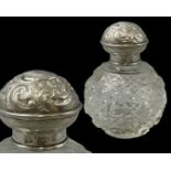 Antique silver lidded glass perfume bottle hallmarked Birmingham 1907. The silver lid has a total