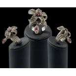 Unusual silver marcasite and ruby snake and flower style ring, weight 12.10 grams, size N