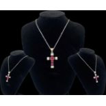 Silver rubilite and opal panelled crucifix on necklace, weighing 6.36 grams 46cm in length