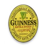 A cast metal traditionally brewed "Guinness Extra Stout" "St James's Gate Dublin" sign