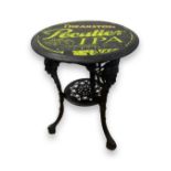 Well designed cast metal Theakston Peculier IPA inspired pub table, 69cm in height, 59cm in diameter