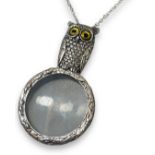 Silver owl form magnifying pendant necklace, chain approximately 23cm in length, weighing 17.01