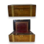 Oak and brass writing slope with a red leather interior, also includes a brass lidded ink well,