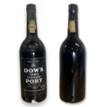 Dow's 1980 vintage port Bottles, 1982 Portuguese wine, still sealed and in good condition