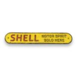 A cast metal Shell 'Motor Spirit Sold Here' sign