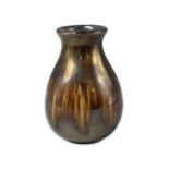 A pair of Poole Pottery brown lustre vases, largest measuring 26cm in height and the smallest 10cm