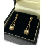Pair of 9ct yellow gold pearl rope drop earrings weighing 0.9 grams