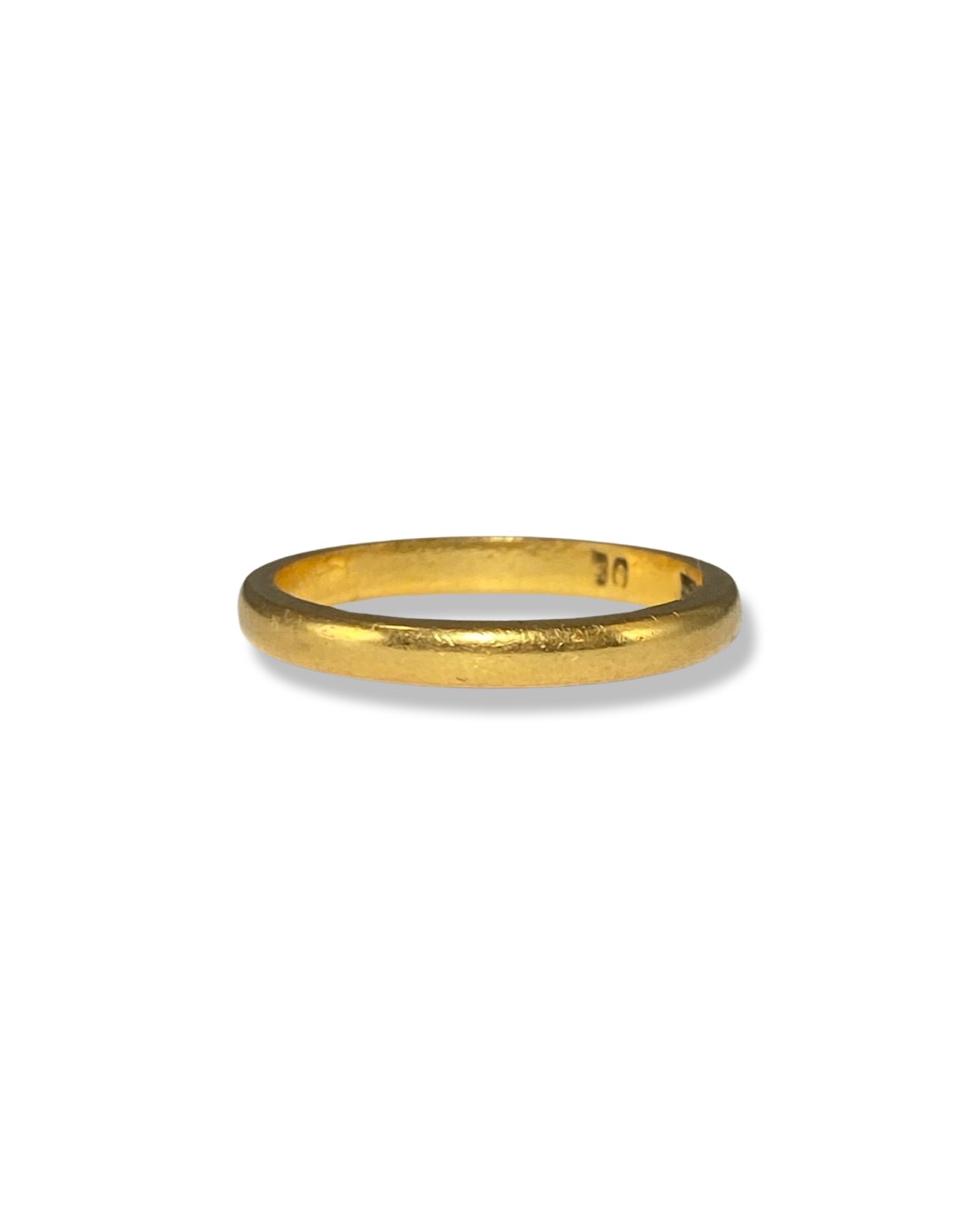 22ct yellow gold band ring weighing 2.66 grams and is a size J 1/2