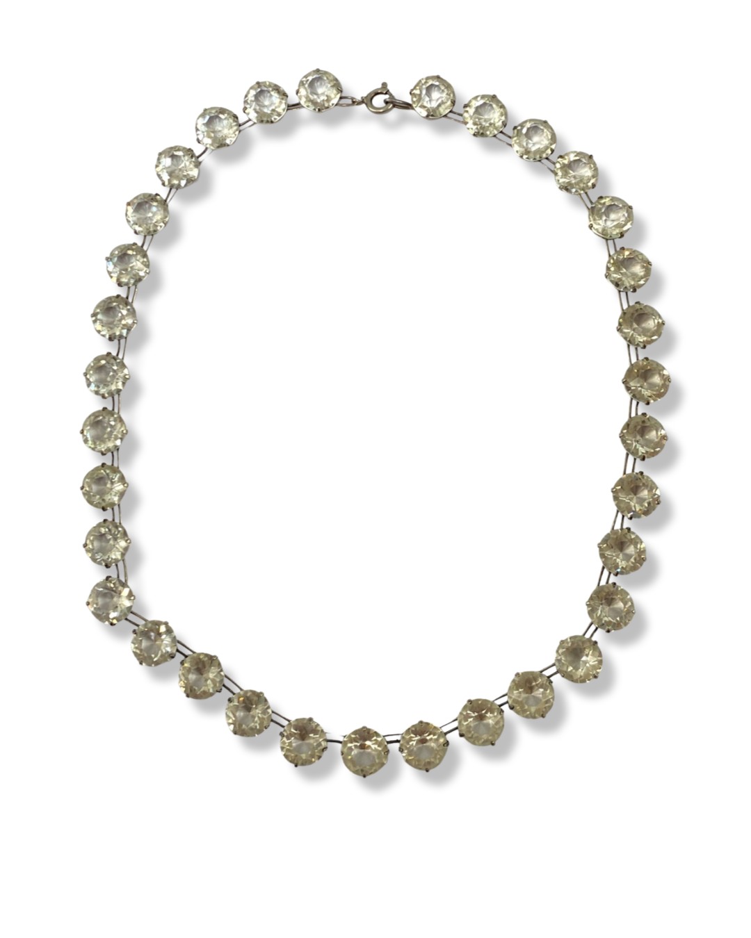 An Art Deco Silver Paste Rivere Necklace weighing 24.68 grams measuring 36.5cm in length