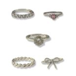 Collection of five silver rings all of different designs weighing 10.18 grams collectively Silver