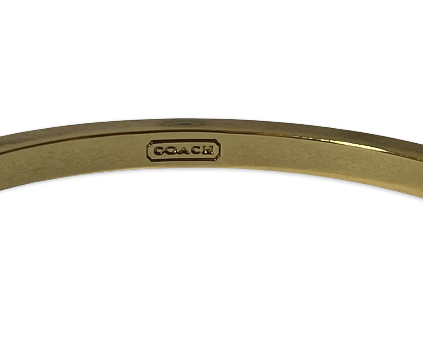 Pair of bangles by Coach, one gold tone and the other rose, weighing 73.3 grams collectively - Image 2 of 3