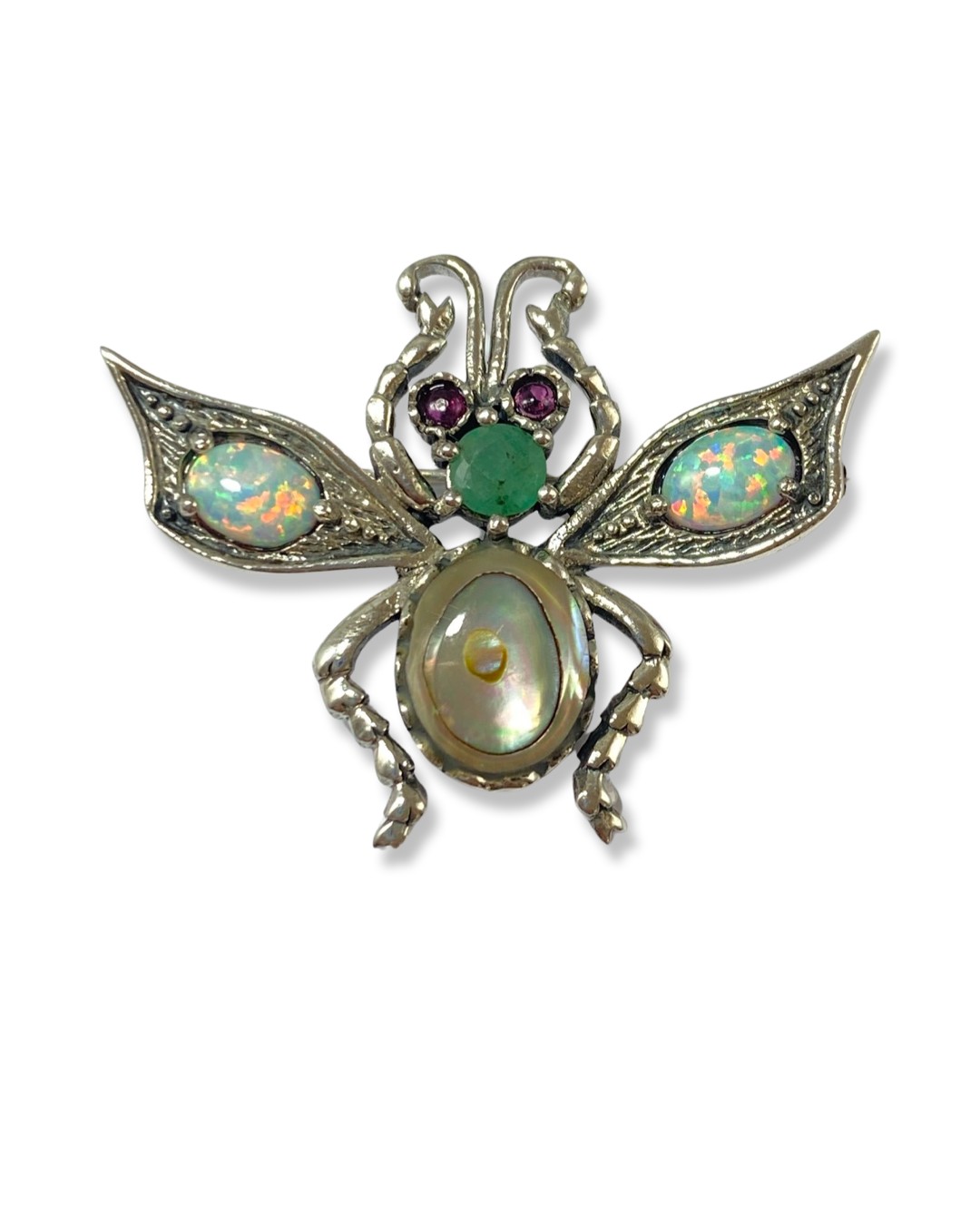 Silver bug brooch comprising of multiple stones throughout including opals weighing 7.87 grams