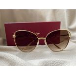 Cartier Cat Eye Shaped Sunglasses from their Panthere Collection complete with box and papers.