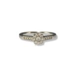 9ct white gold, fancy design diamond ring weighing 2.25 grams and is size N 1/2