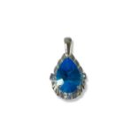 9ct Birmingham White Gold London Blue Topaz and diamond Pendant comprising of a pear-shaped topaz