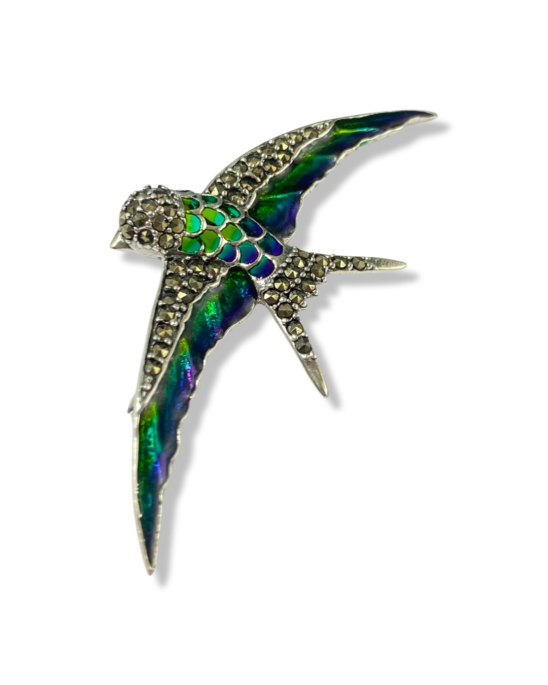 Silver, Plique a Jour and marcasite bird brooch weighing 7.87 grams, measuring 3cm in length and 7cm