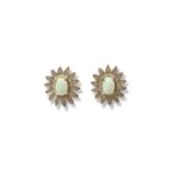 Pair of silver, Opal and white stone fancy design stud earrings weighing 2.76 grams