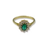 18ct Yellow Gold Emerald and Diamond cluster ring featuring an oval emerald weighing approximately