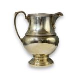 Silver milk cup hallmarked Birmingham 1930, weight 138 grams, with a height of 11.5cm
