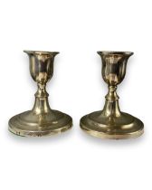 Silver Sheffield candle sticks with a combined weight of 295 grams