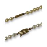 A pair of Vintage Pearl Strands both set with 9ct gold clasps The longest Strand Measures 62cm in