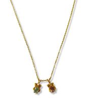 Three gold plated pendants featuring Garnet, Amethyst and Blue Topaz on two gold plated chains, with