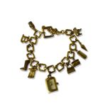 Burberry silver gold tone charm bracelet which includes a working watch charm, weighing 63.03