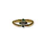 18ct Yellow Gold Fancy Design ring comprising of an Emerald cut Diamond surrounded by four