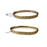 Two 9ct Yellow Gold Bangles with metal cores weighing 21.35 grams collectively