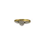 18ct Gold Two-Tone Diamond Solitaire Ring with Diamond Shoulders weighing 2.24 grams size J 1/2