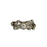 18ct White Gold Fancy Design Diamond Ring with a approximate .15ct centre stone weighing 2.78