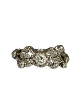 18ct White Gold Fancy Design Diamond Ring with a approximate .15ct centre stone weighing 2.78