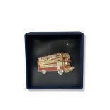 Butler & Wilson gem set red bus brooch still in its seal and box. Dimensions 6cm x 3.5cm