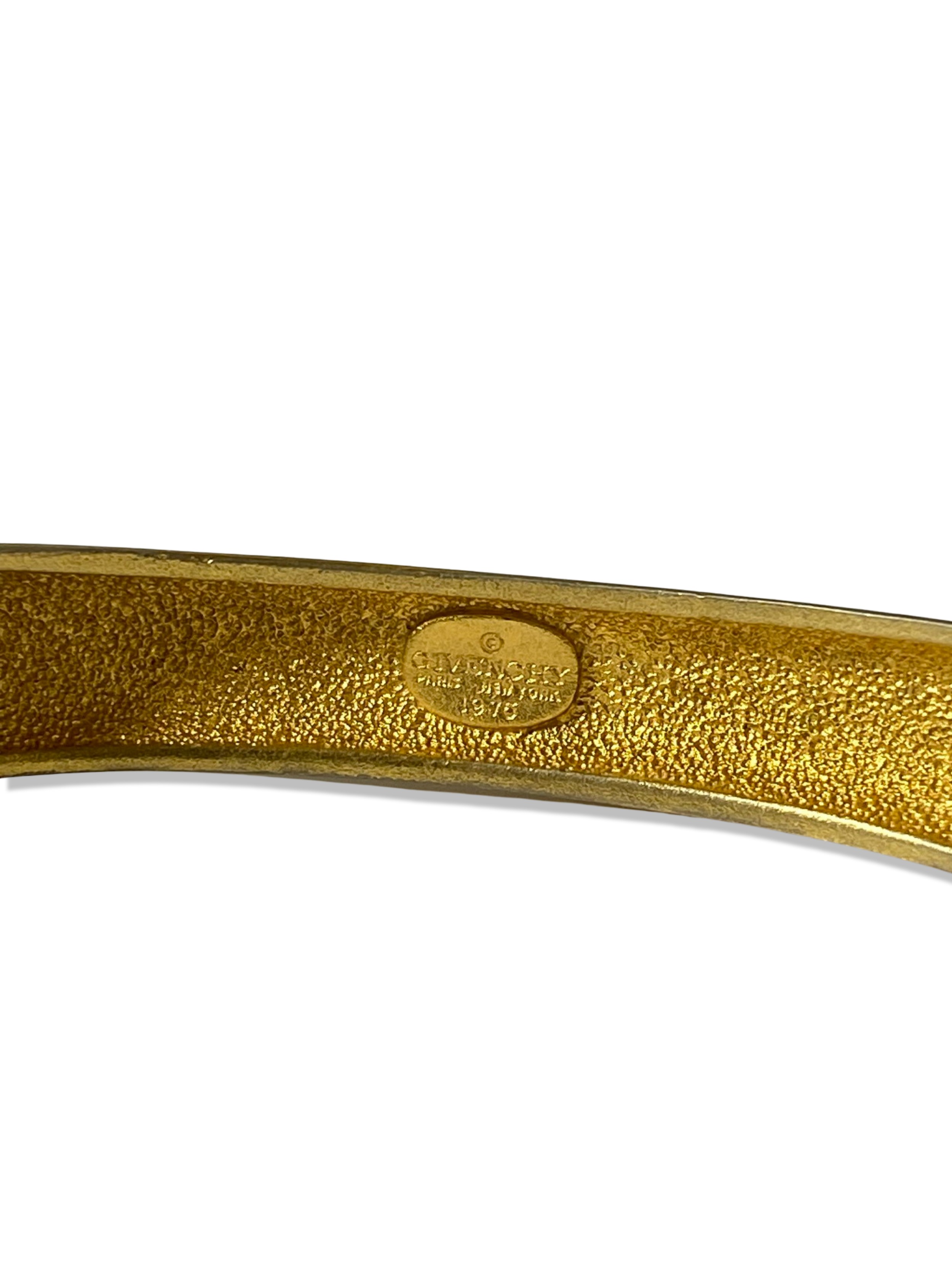 Givenchy Gold Tone Bangle with a Green Centre Stone weighing 49.53 grams - Image 2 of 2