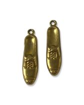 A pair of 9ct Gold Shoe Charms Weighing 1.24 grams collectively 1.24 grams