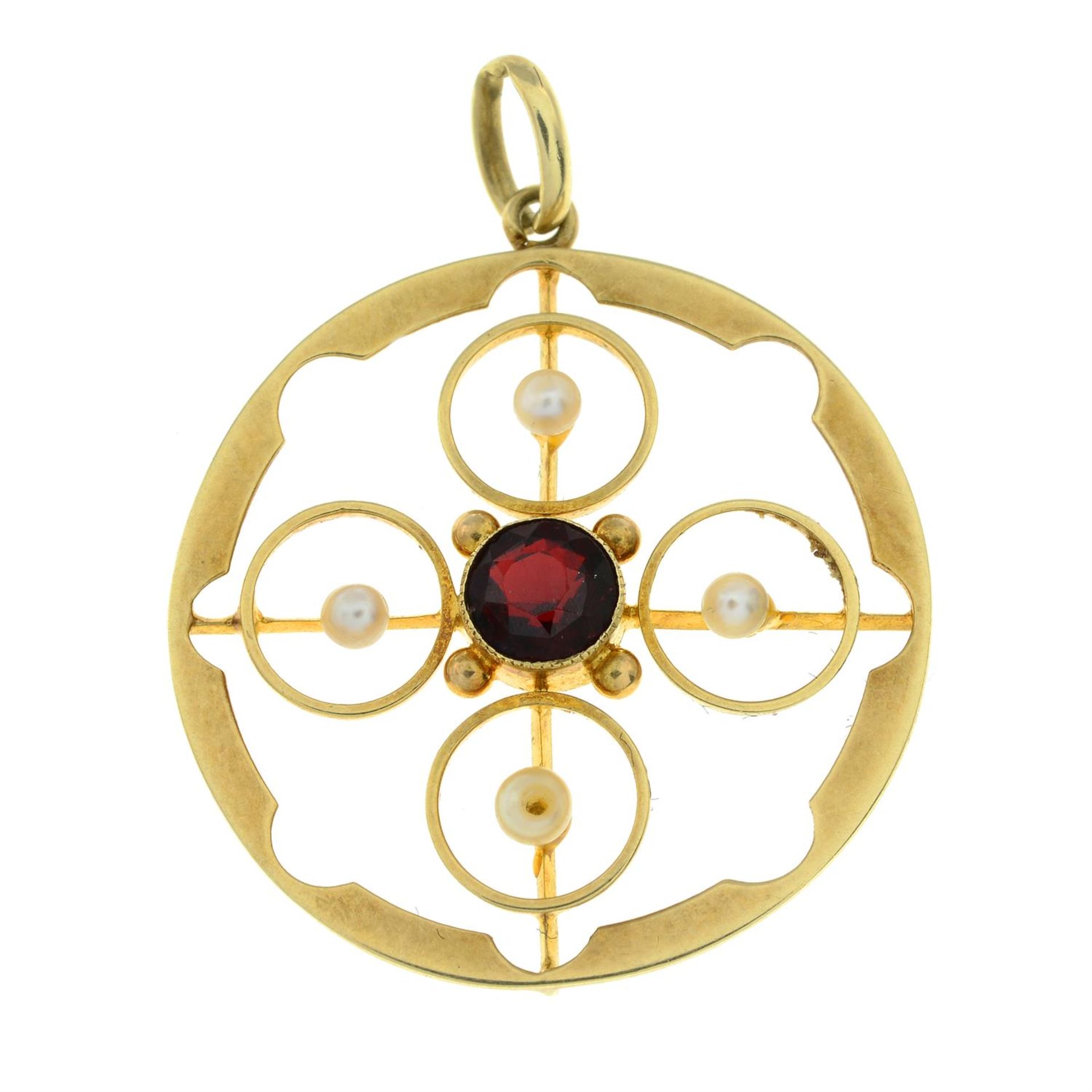 An early 20th century 15ct gold garnet-topped-doublet and seed pearl pendant.