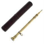 A late 19th century gold retractable pencil, with bloodstone monogram seal terminal.