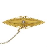 An Edwardian 15ct gold split pearl brooch.