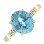 A 9ct gold blue zircon single-stone ring, with diamond accent shoulders.
